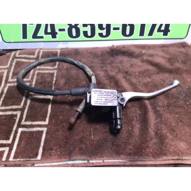 1986 SUZUKI QUADRUNNER LTF230 LTF 230 G FRONT BRAKE MASTER CYLINDER LEVER PERCH